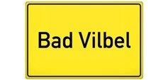 Gelbes Ortsschild mit schwarzer Schrift 'Bad Vilbel'