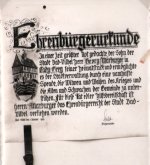 Schwarz-weiße Ehrenbürgerurkunde für Ehrenbürger Georg Marburger mit dekorativem Schriftzug, kleinem Bild eines Turms und handschriftlicher Unterschrift